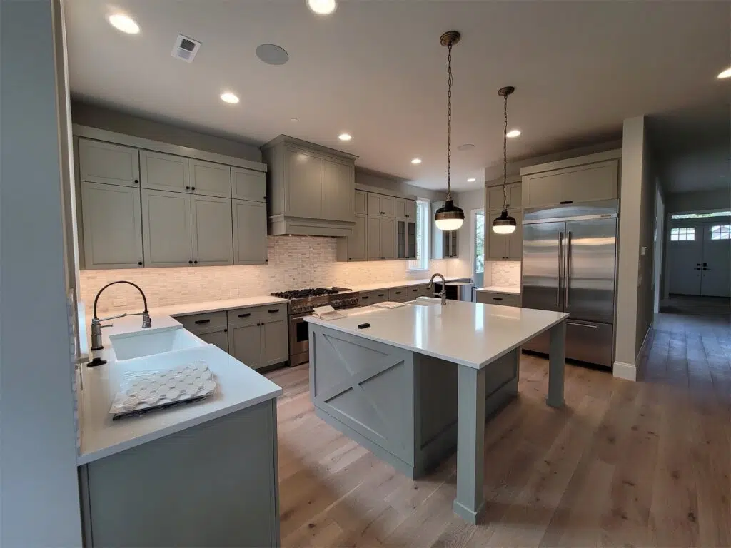 Kirkland Home Renovation Due-Diligence Checklist: Licenses, Bids, Insurance and Contracts 4 Finished kitchen remodel by CHC Remodel with gray cabinets and a center island