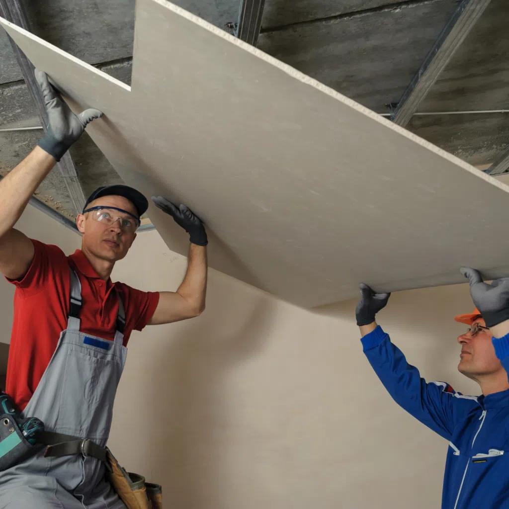 Kirkland Home Renovation Due-Diligence Checklist: Licenses, Bids, Insurance and Contracts 3 Crew installing drywall on a ceiling during a home remodel