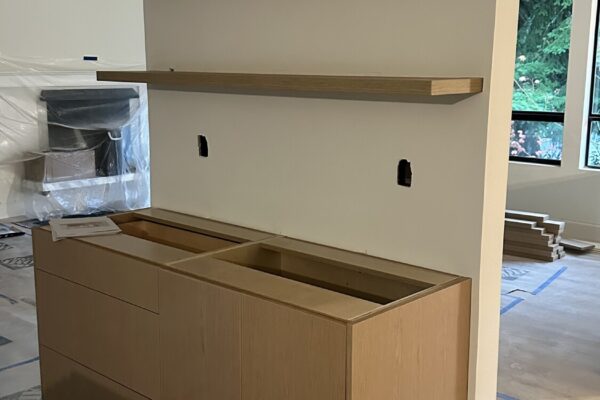 Custom Cabinet Installation in Progress Custom kitchen cabinetry installation in progress