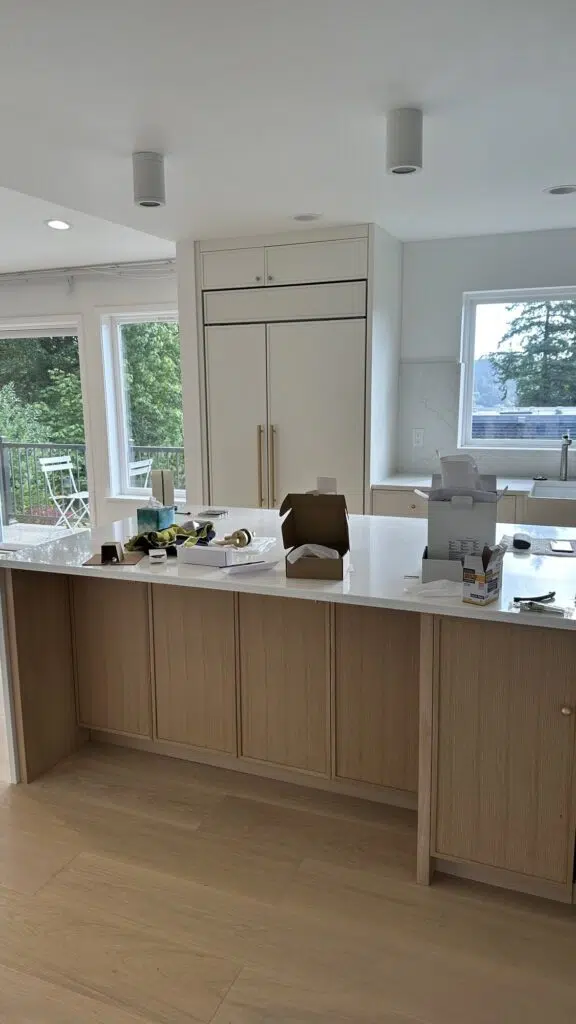 Custom kitchen island and light wood cabinets in Kirkland