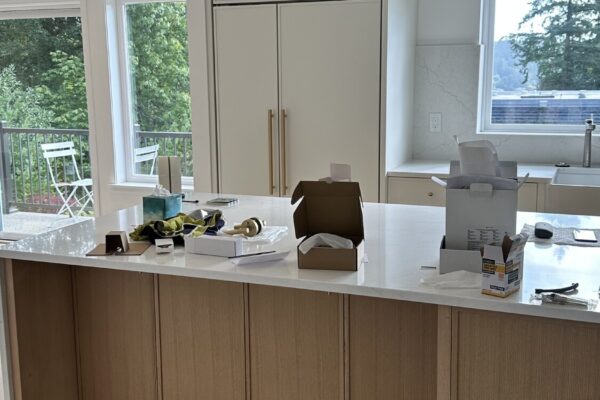 Custom Kitchen Cabinets – Wide Island Custom kitchen island and light wood cabinets in Kirkland